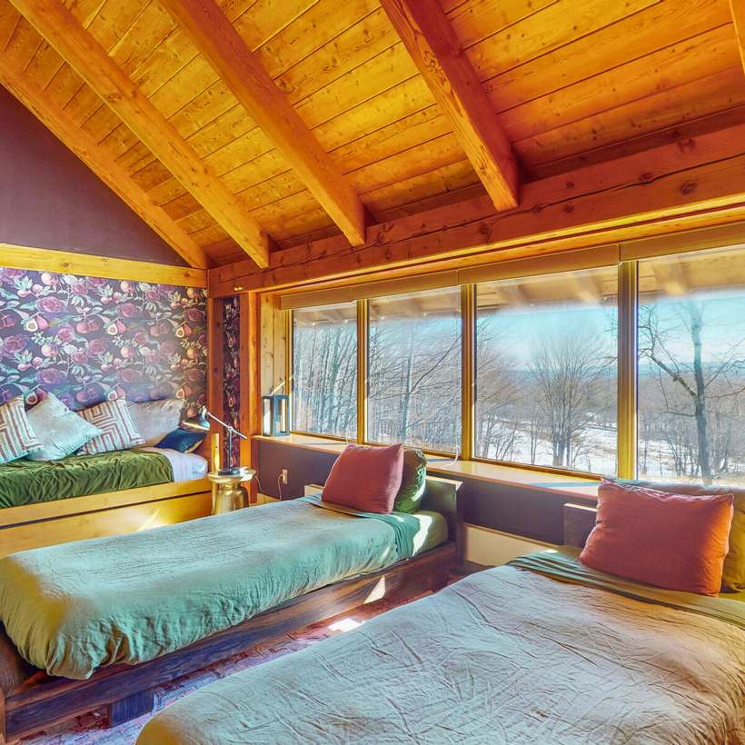 Shared cabin room with separate beds facing the windows